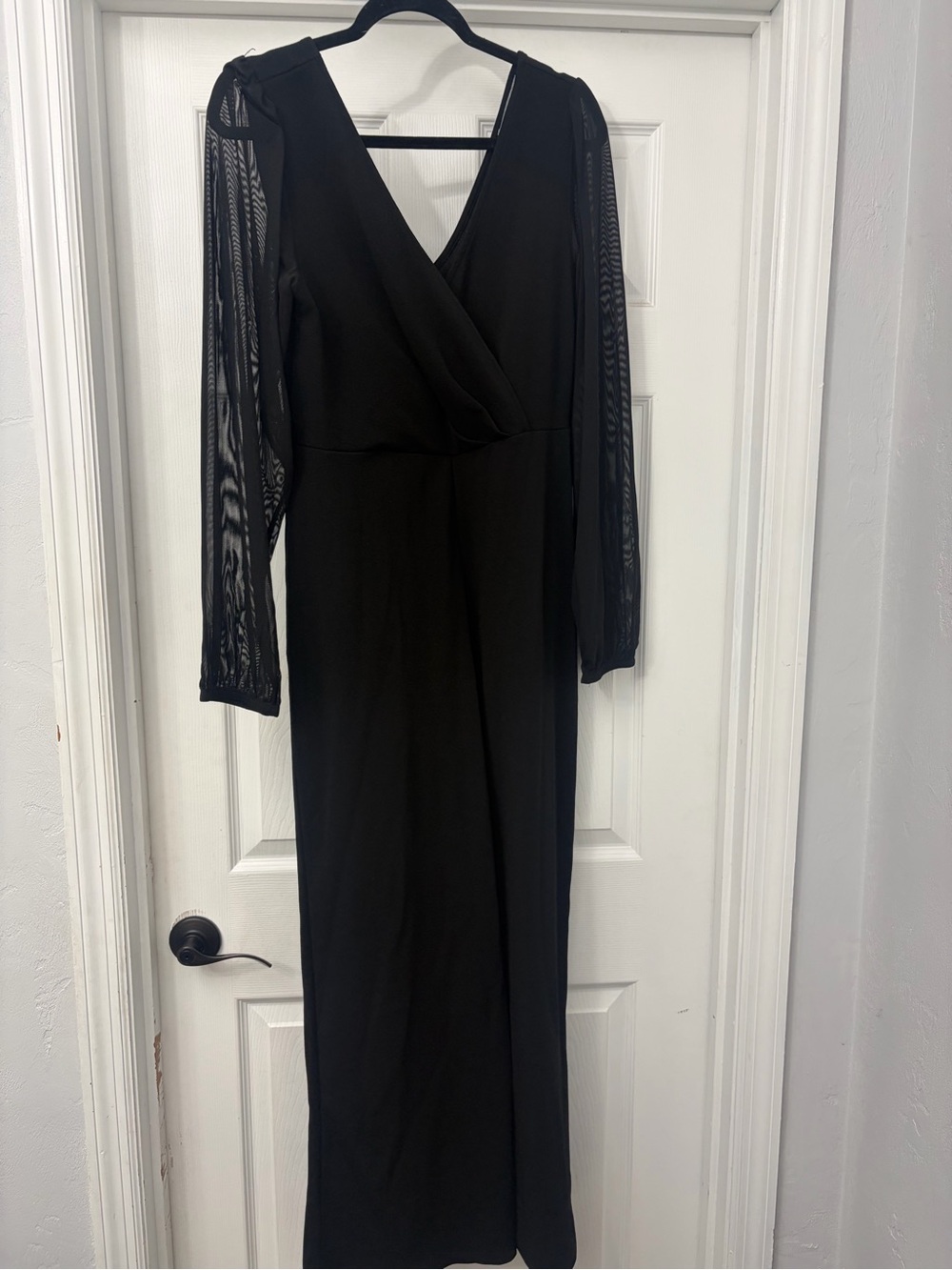 Black Long Sleeve V-Neck Women’s jumpsuit with sheer sleeves